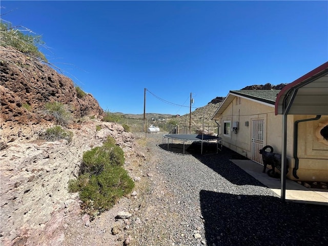 2405 N Clack Canyon Rd, Kingman, AZ 86409 - view of yard with a trampoline