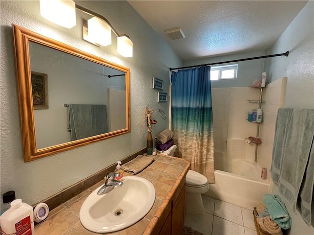 2405 N Clack Canyon Rd, Kingman, AZ 86409 - bathroom featuring shower / bathtub combination with curtain, vanity, a textured wall, tile patterned floors, and a textured ceiling