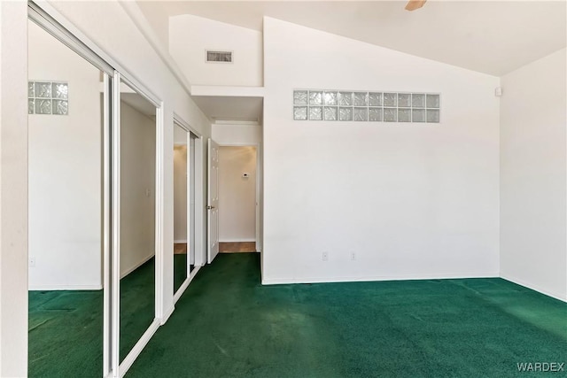 2190 Hijolly Dr, Bullhead City, AZ 86442 - carpeted spare room featuring visible vents and lofted ceiling