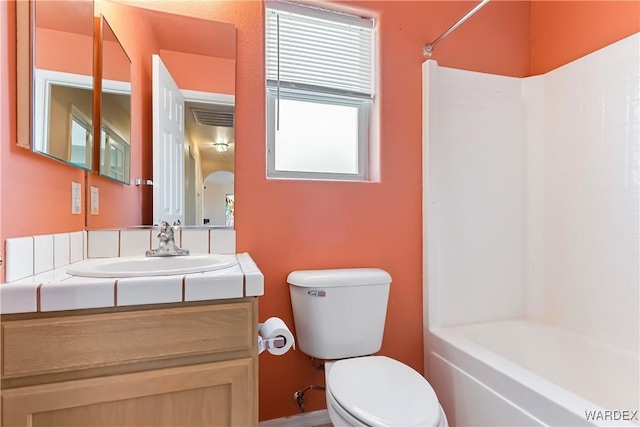 2190 Hijolly Dr, Bullhead City, AZ 86442 - bathroom with toilet, vanity, and bathing tub / shower combination
