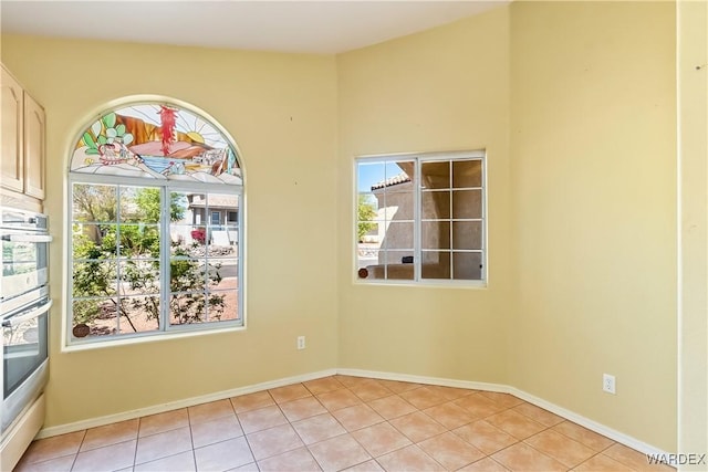 2190 Hijolly Dr, Bullhead City, AZ 86442 - unfurnished room with light tile patterned floors and baseboards