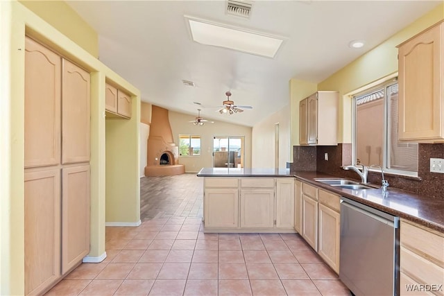 2190 Hijolly Dr, Bullhead City, AZ 86442 - kitchen featuring visible vents, a ceiling fan, a peninsula, stainless steel dishwasher, and light tile patterned flooring