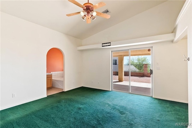 2190 Hijolly Dr, Bullhead City, AZ 86442 - carpeted spare room featuring visible vents, baseboards, arched walkways, a ceiling fan, and high vaulted ceiling