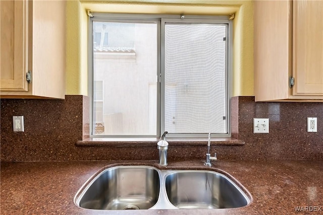 2190 Hijolly Dr, Bullhead City, AZ 86442 - kitchen with tasteful backsplash, a sink, and dark countertops