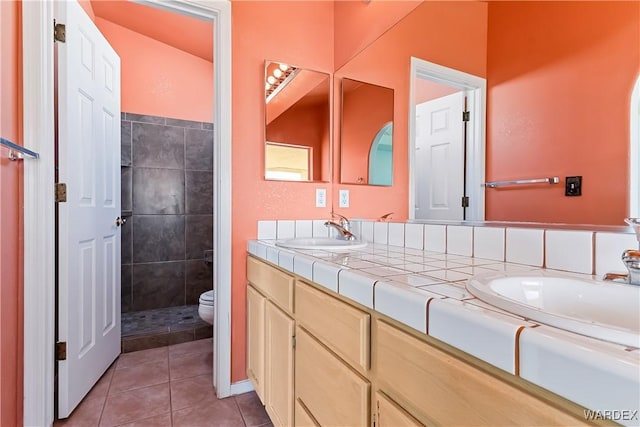 2190 Hijolly Dr, Bullhead City, AZ 86442 - full bath featuring toilet, double vanity, a sink, and tile patterned flooring