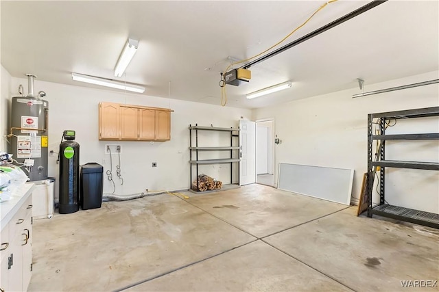 2190 Hijolly Dr, Bullhead City, AZ 86442 - garage with a garage door opener and gas water heater