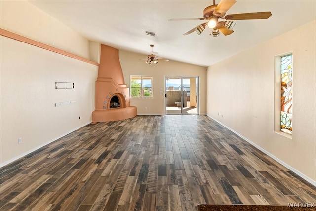2190 Hijolly Dr, Bullhead City, AZ 86442 - unfurnished living room featuring baseboards, a ceiling fan, lofted ceiling, and dark wood finished floors