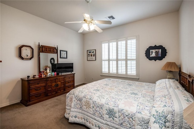 bedroom featuring light carpet, a ceiling fan, visible vents, and baseboards