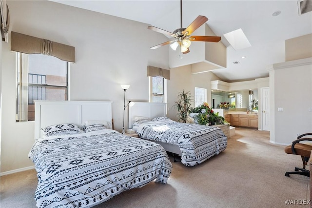 bedroom with light carpet, a skylight, baseboards, visible vents, and high vaulted ceiling