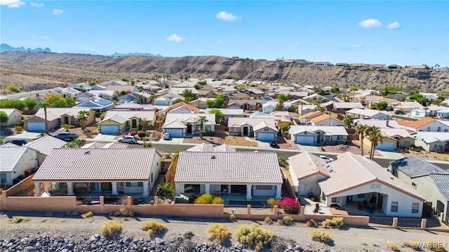 birds eye view of property with a residential view and a mountain view