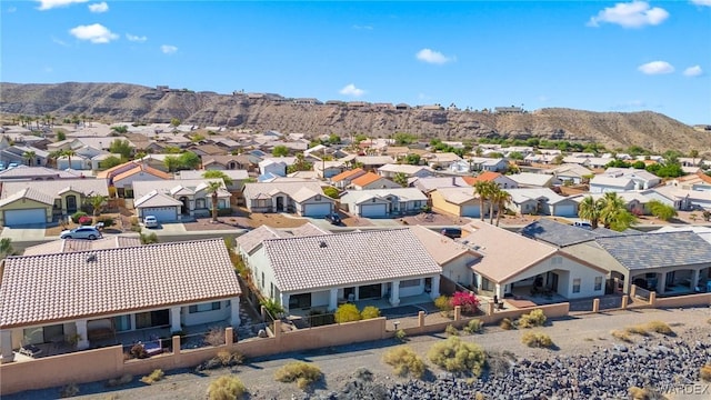 bird's eye view with a residential view and a mountain view