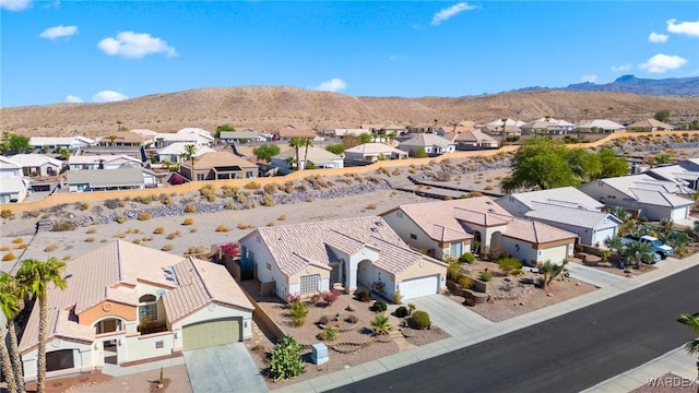 bird's eye view with a mountain view and a residential view