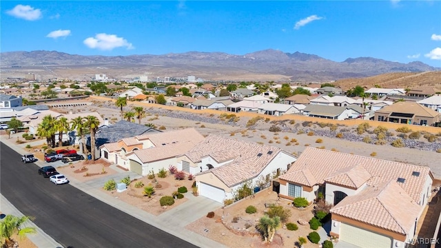 aerial view with a mountain view and a residential view