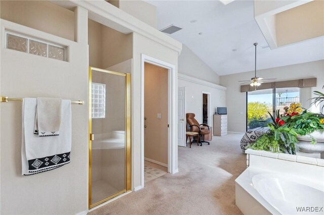 bathroom featuring high vaulted ceiling, visible vents, a ceiling fan, a shower stall, and a bath