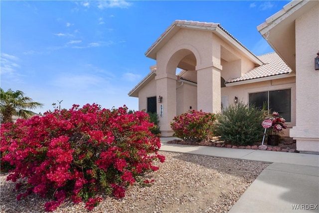 5790 S Gazelle Dr, Fort Mohave, AZ 86426 - entrance to property with stucco siding and a tiled roof