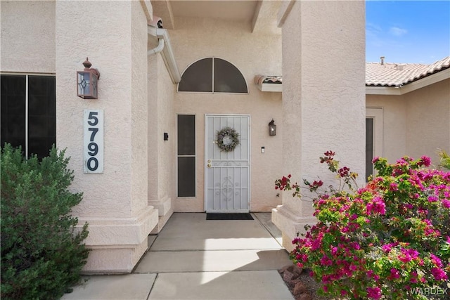 5790 S Gazelle Dr, Fort Mohave, AZ 86426 - entrance to property with a tile roof and stucco siding