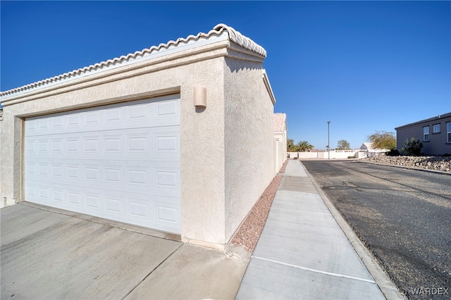 garage with driveway