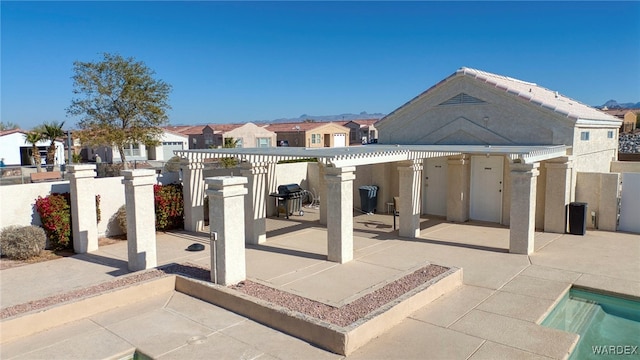 view of patio with a grill and a residential view