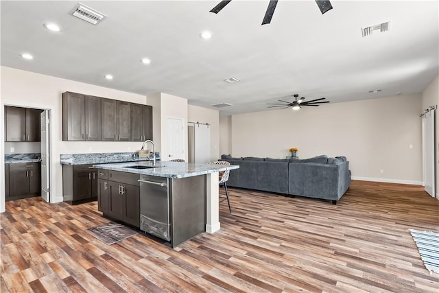 6183 S Lago Grande Dr, Fort Mohave, AZ 86426 - kitchen featuring dishwasher, a ceiling fan, a sink, light wood-type flooring, and recessed lighting