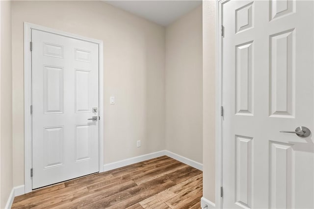 6183 S Lago Grande Dr, Fort Mohave, AZ 86426 - doorway with wood finished floors and baseboards
