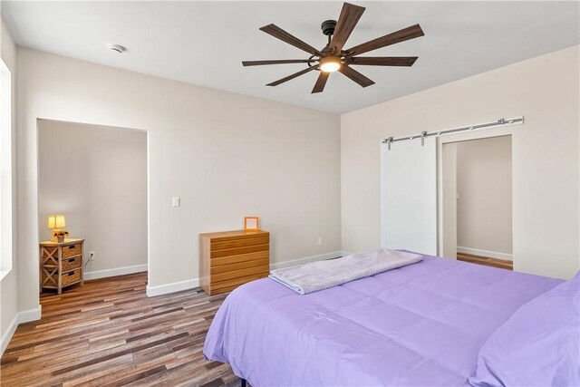 6183 S Lago Grande Dr, Fort Mohave, AZ 86426 - bedroom featuring wood finished floors, baseboards, and a ceiling fan