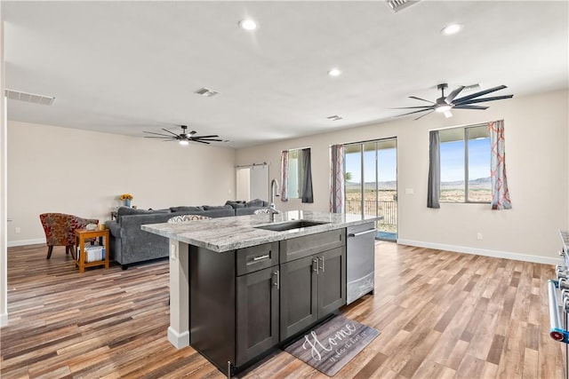 6183 S Lago Grande Dr, Fort Mohave, AZ 86426 - kitchen with a sink, ceiling fan, stainless steel dishwasher, open floor plan, and recessed lighting