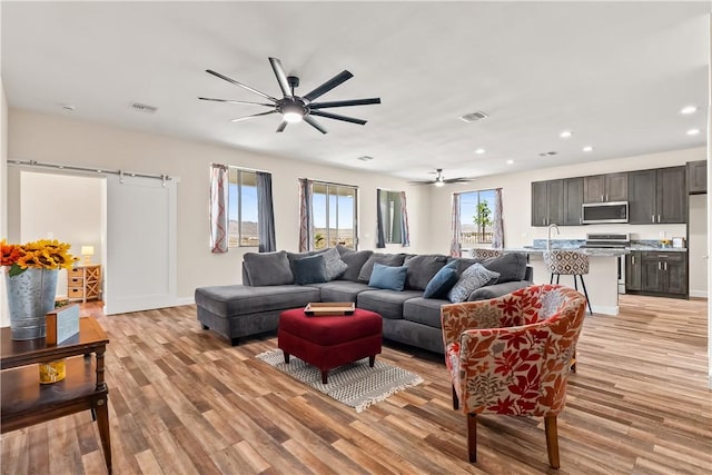 6183 S Lago Grande Dr, Fort Mohave, AZ 86426 - living area with ceiling fan, light wood-style floors, recessed lighting, and baseboards