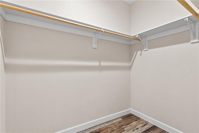 6183 S Lago Grande Dr, Fort Mohave, AZ 86426 - walk in closet featuring wood finished floors