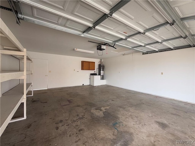 garage with secured water heater and a garage door opener