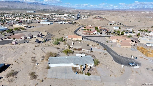 bird's eye view featuring a residential view and a mountain view