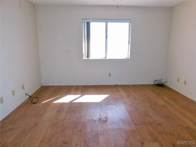 empty room featuring light wood-style floors