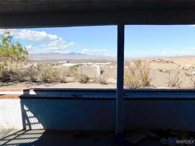 details with a mountain view and a pool