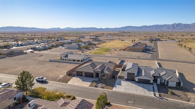 drone / aerial view with a residential view and a mountain view