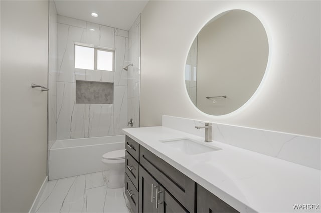 full bath featuring marble finish floor, recessed lighting, shower / bath combination, toilet, and vanity