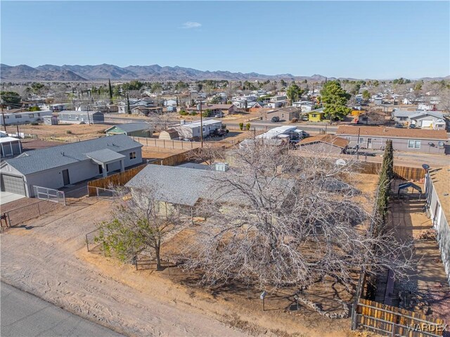 drone / aerial view with a residential view and a mountain view