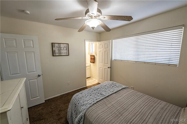 bedroom with ceiling fan and light colored carpet