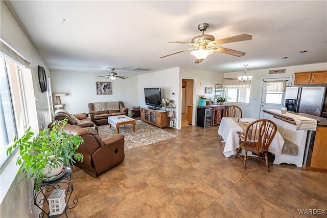 living area with a ceiling fan