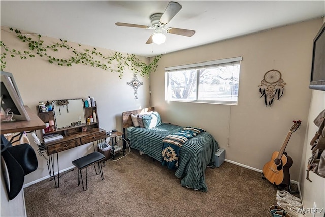 carpeted bedroom featuring ceiling fan and baseboards