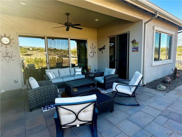 view of patio / terrace featuring ceiling fan and outdoor lounge area