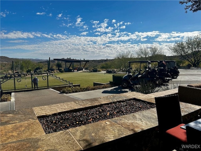 view of patio featuring a gate