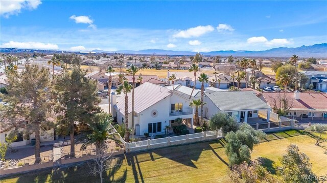 bird's eye view featuring a residential view and a mountain view