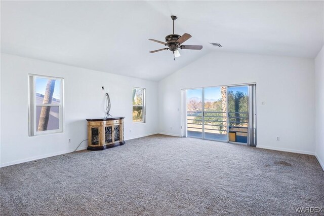 unfurnished living room with carpet floors, lofted ceiling, visible vents, ceiling fan, and baseboards