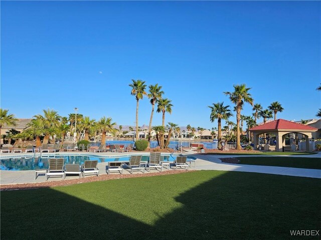 6246 S Vista Laguna Dr, Fort Mohave, AZ 86426 - community pool with a gazebo and a yard