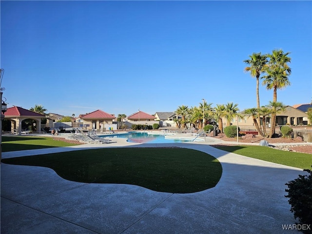 6246 S Vista Laguna Dr, Fort Mohave, AZ 86426 - view of yard featuring a gazebo, a residential view, a patio area, and a community pool