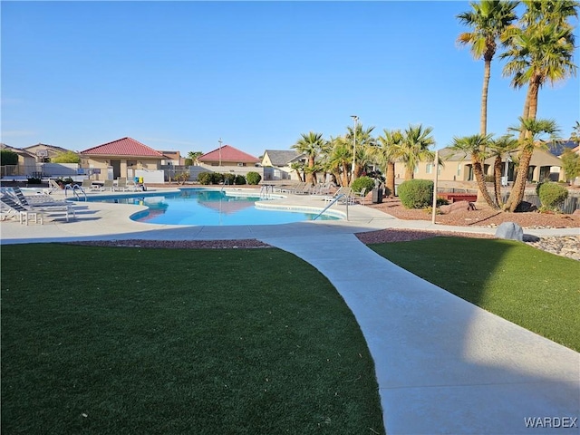 6246 S Vista Laguna Dr, Fort Mohave, AZ 86426 - pool with a residential view, a lawn, and a patio