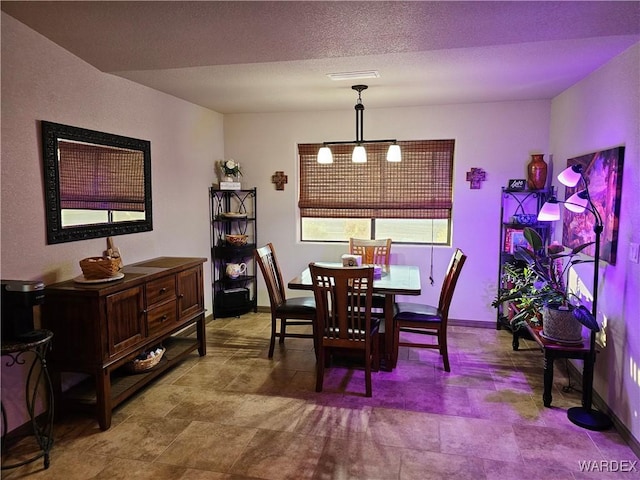 6246 S Vista Laguna Dr, Fort Mohave, AZ 86426 - dining room featuring baseboards