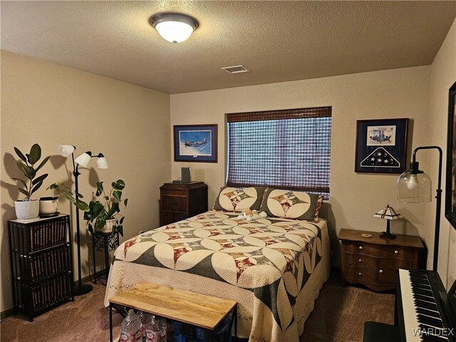 6246 S Vista Laguna Dr, Fort Mohave, AZ 86426 - carpeted bedroom with a textured ceiling and visible vents