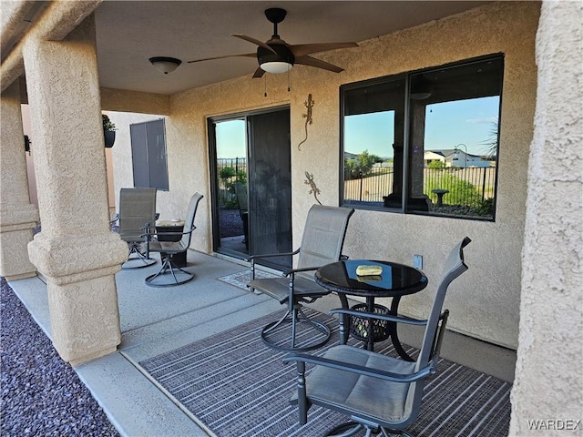 6246 S Vista Laguna Dr, Fort Mohave, AZ 86426 - view of patio / terrace with a ceiling fan and fence