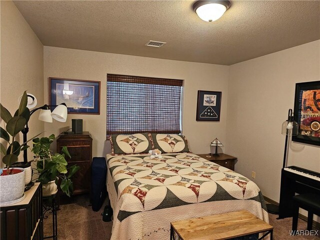 6246 S Vista Laguna Dr, Fort Mohave, AZ 86426 - carpeted bedroom featuring a textured ceiling and visible vents