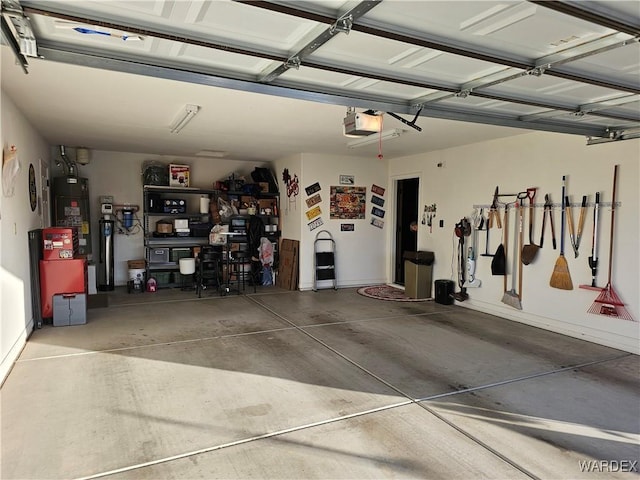 6246 S Vista Laguna Dr, Fort Mohave, AZ 86426 - garage with water heater and a garage door opener